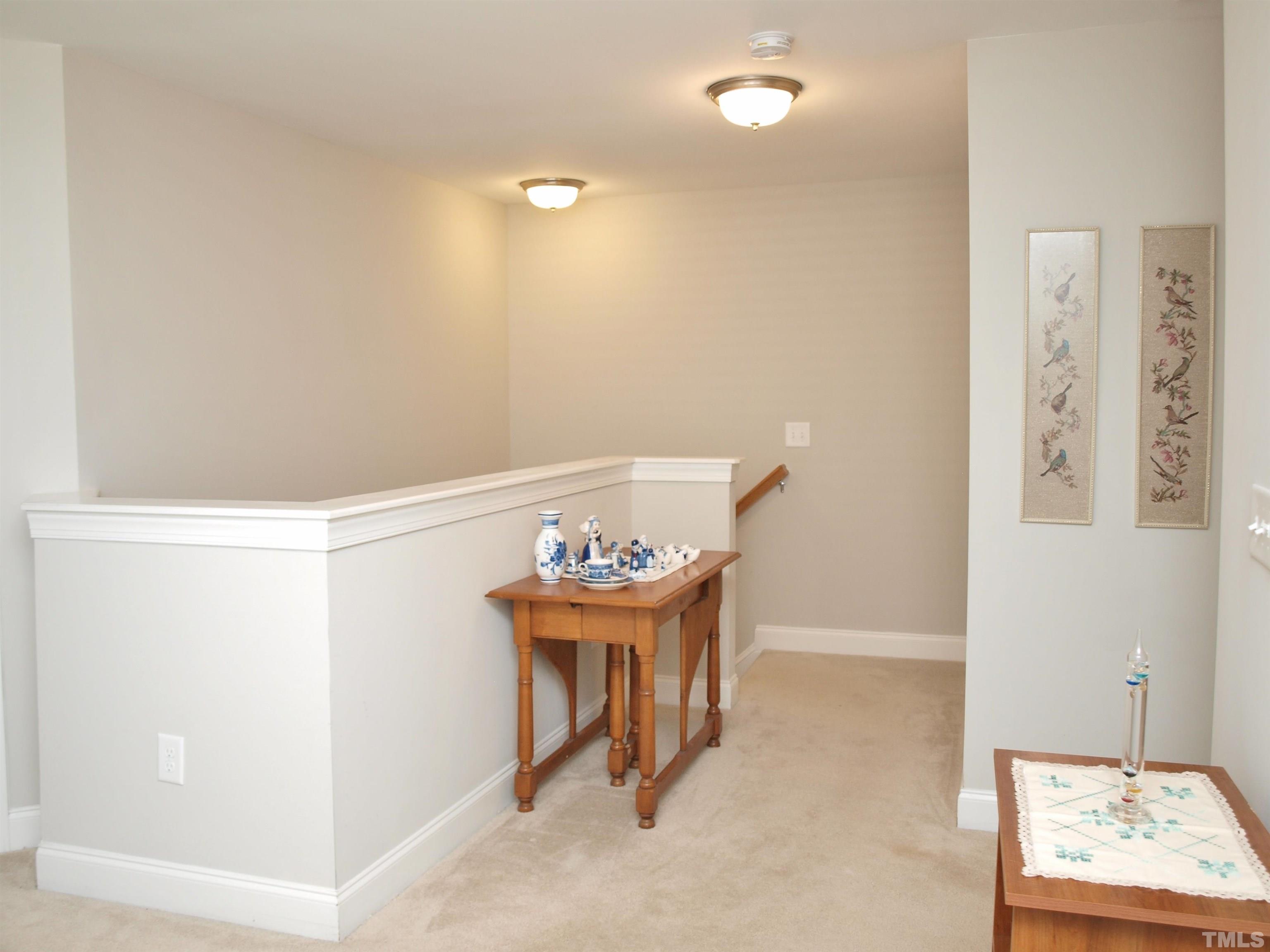 7613 Weathered Oak Way Raleigh, NC 27616 - Photo 18 of 22 Entry to loft from stairwell.