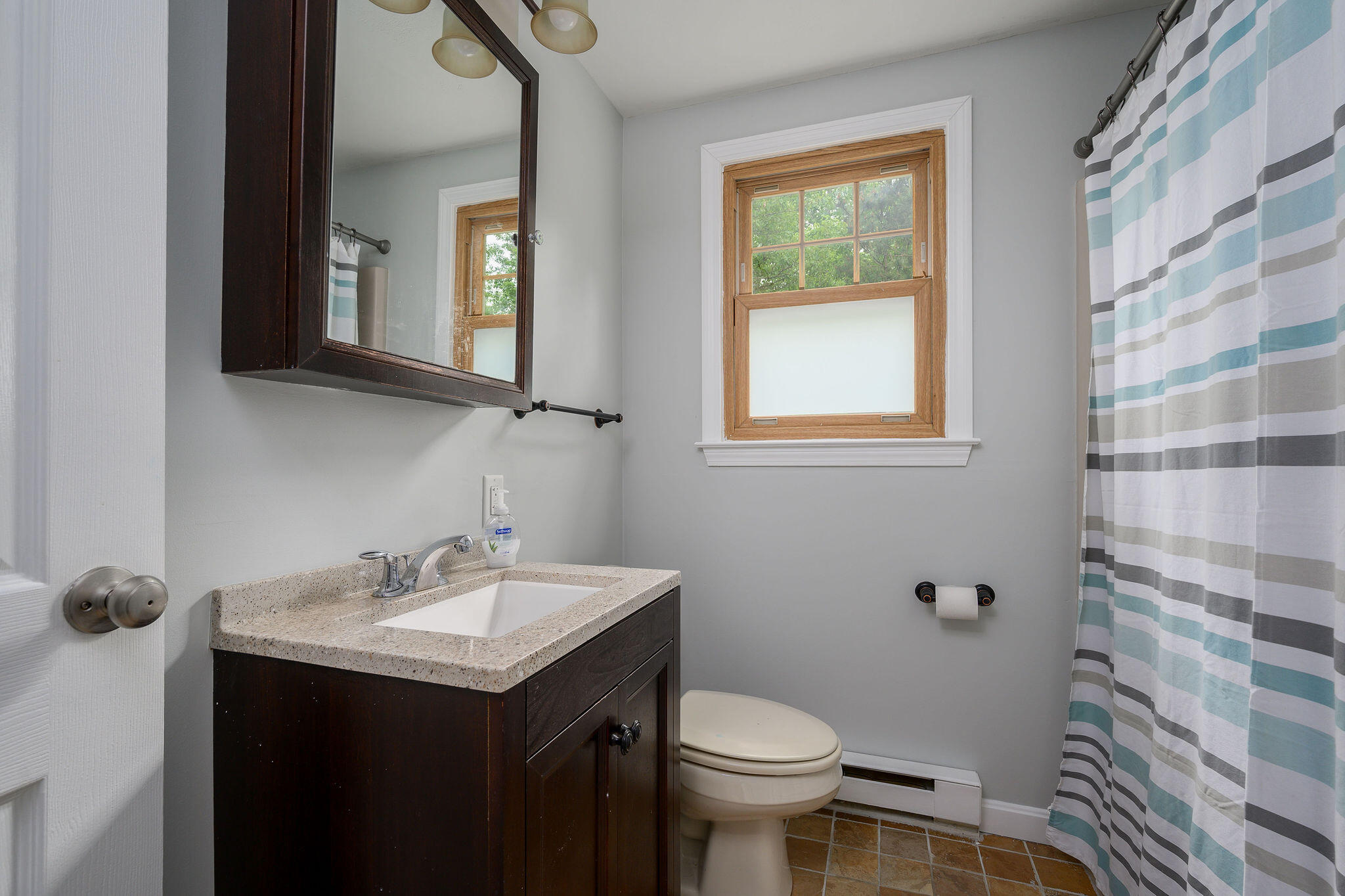 54 Beechwood Drive Mashpee, MA 02649 - Photo 18 of 34 a bathroom with a sink toilet and mirror