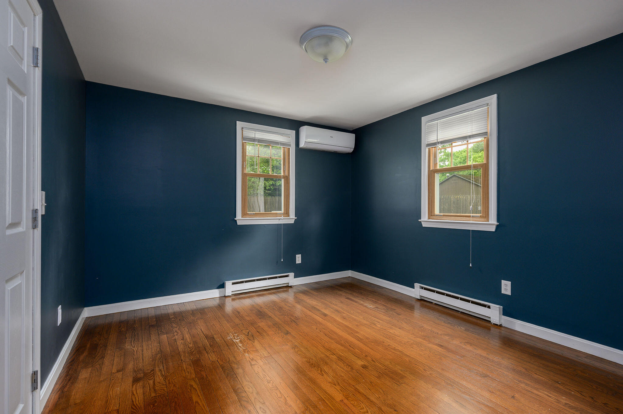 54 Beechwood Drive Mashpee, MA 02649 - Photo 19 of 34 an empty room with windows
