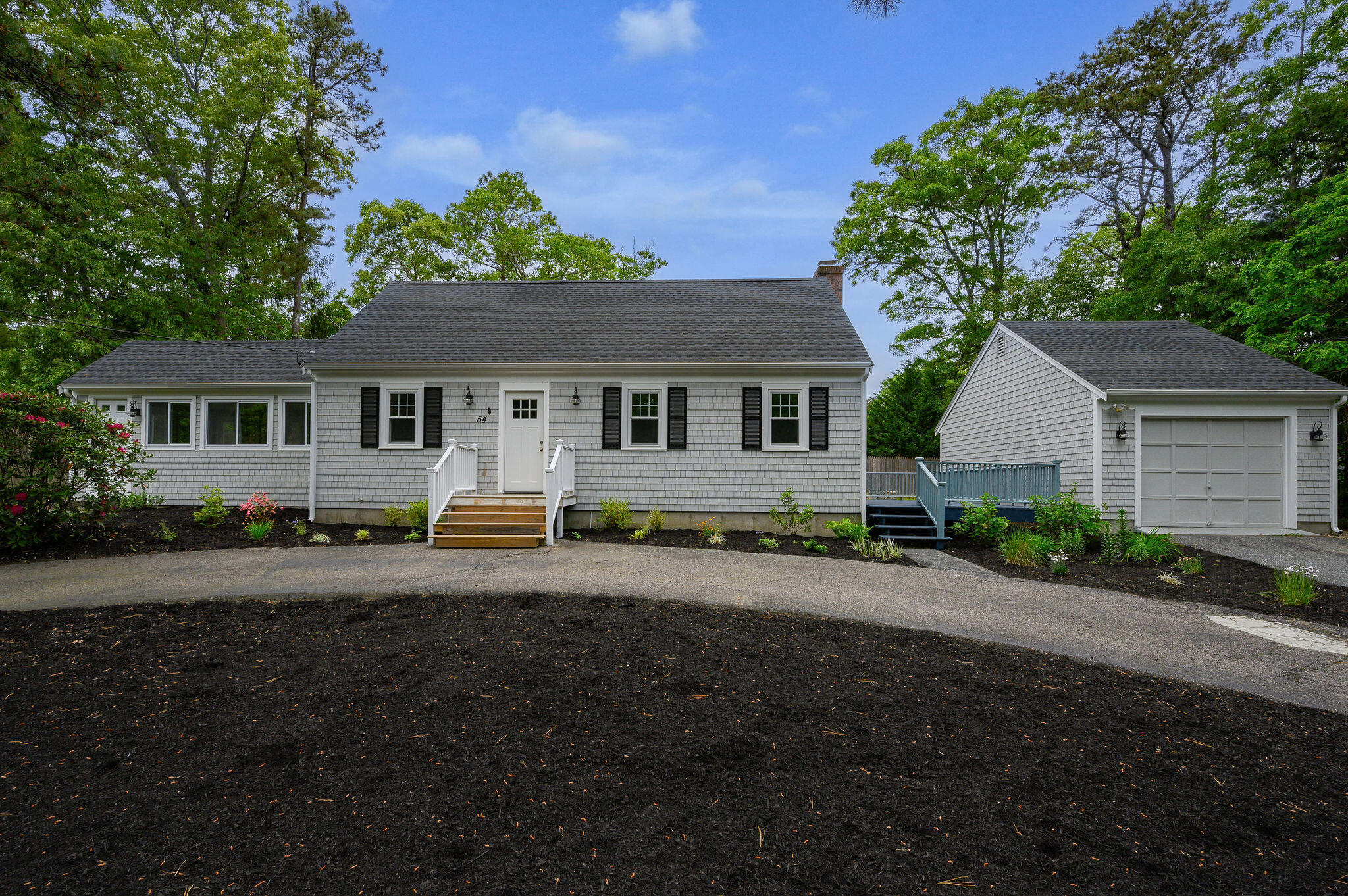54 Beechwood Drive Mashpee, MA 02649 - Photo 2 of 34 a view of a house with a yard and large tree