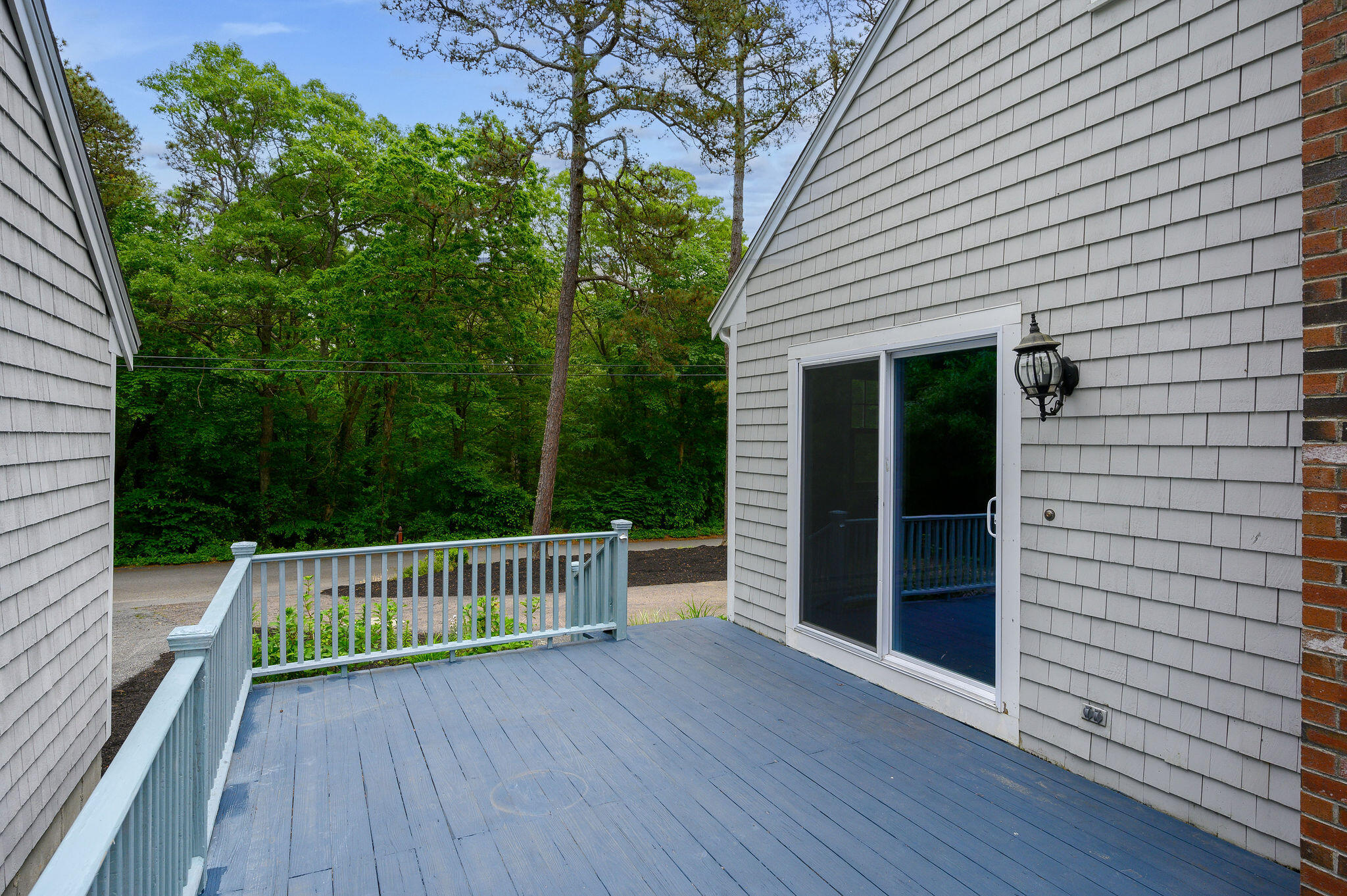 54 Beechwood Drive Mashpee, MA 02649 - Photo 7 of 34 a view of deck and garden