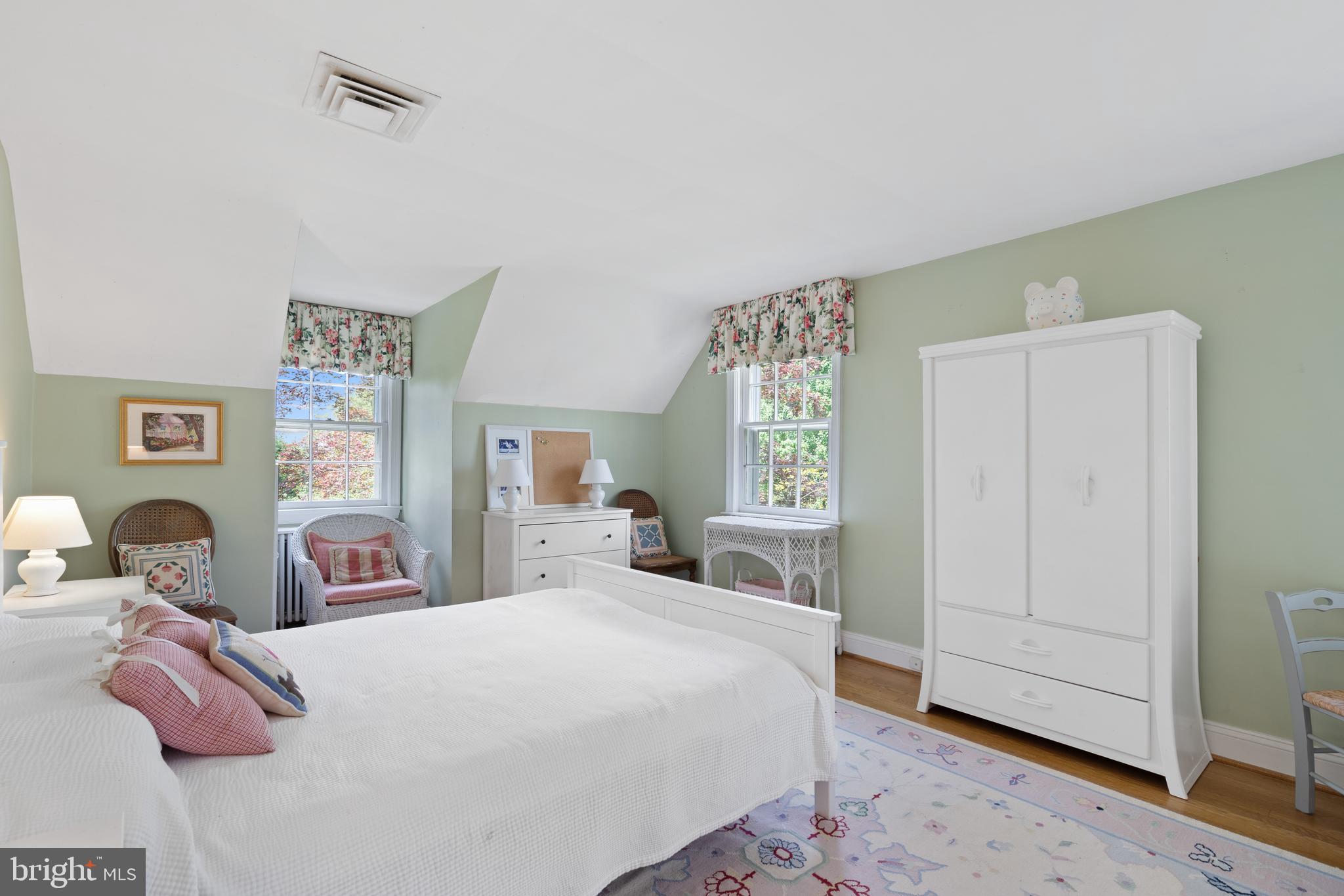 6511 Ridge Street McLean, VA 22101 - Photo 13 of 17 a bedroom with a bed and window