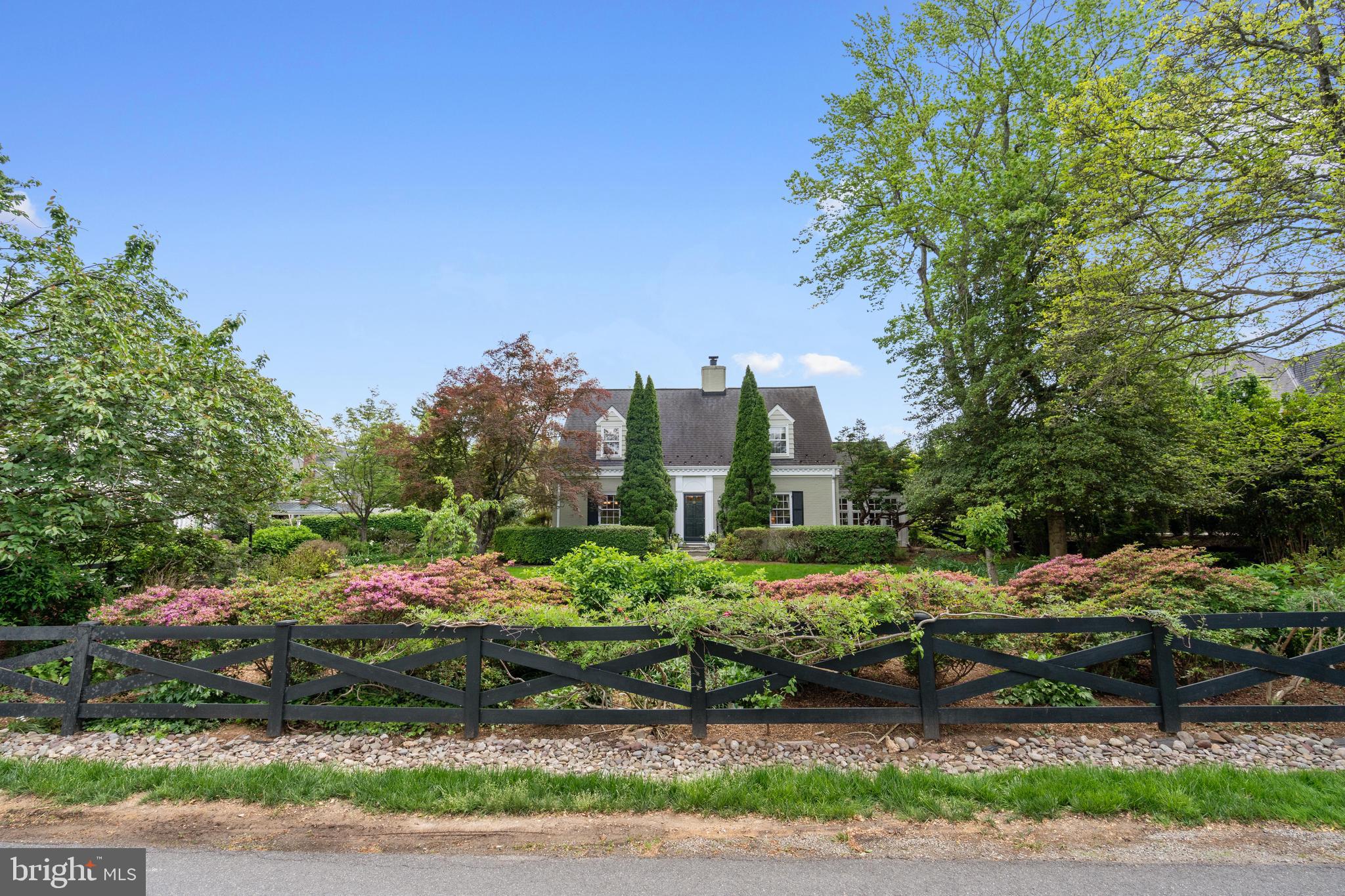 6511 Ridge Street McLean, VA 22101 - Photo 2 of 17 a green field with lots of trees