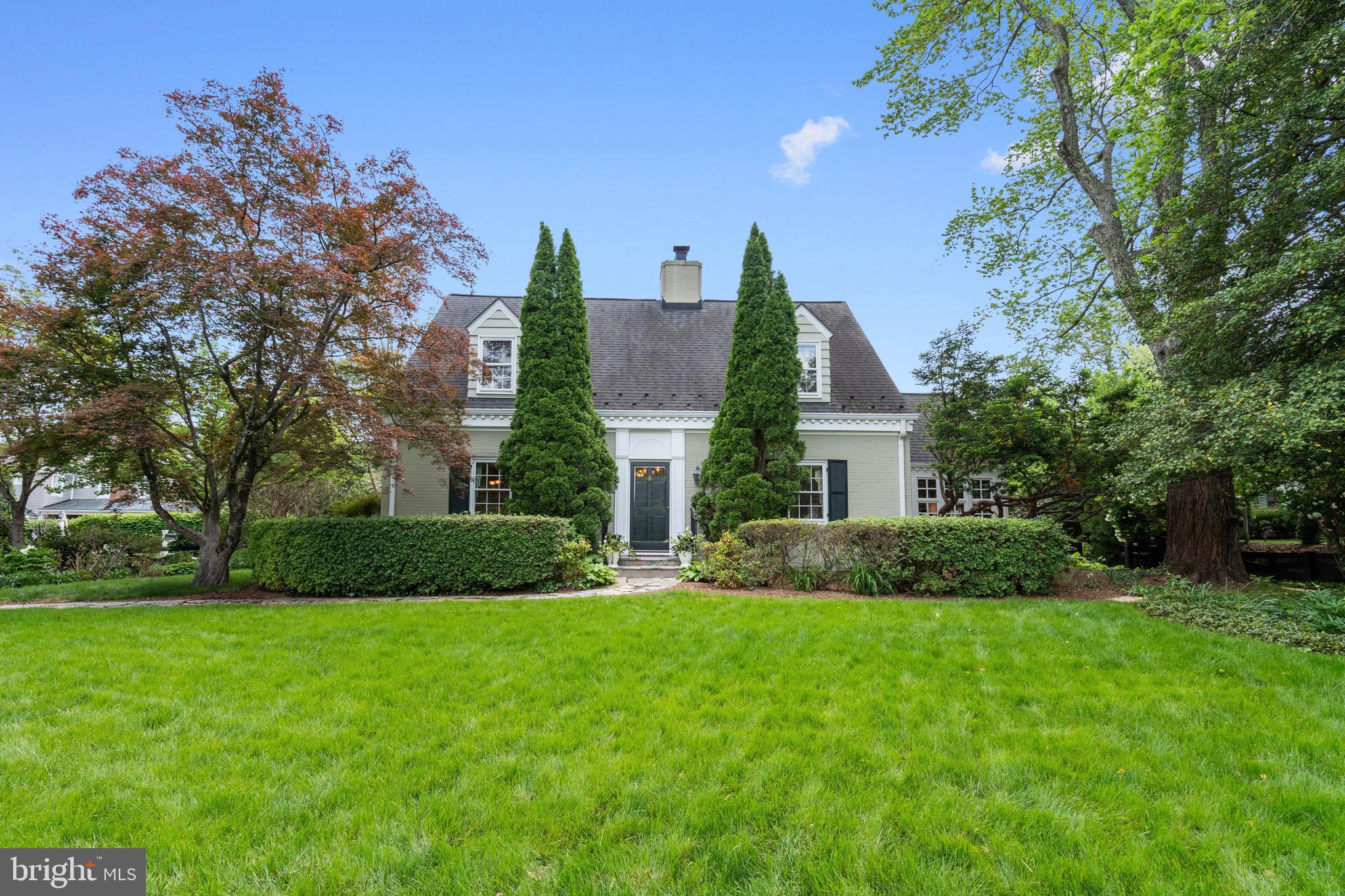 6511 Ridge Street McLean, VA 22101 - Photo 3 of 17 a front view of house with yard and green space