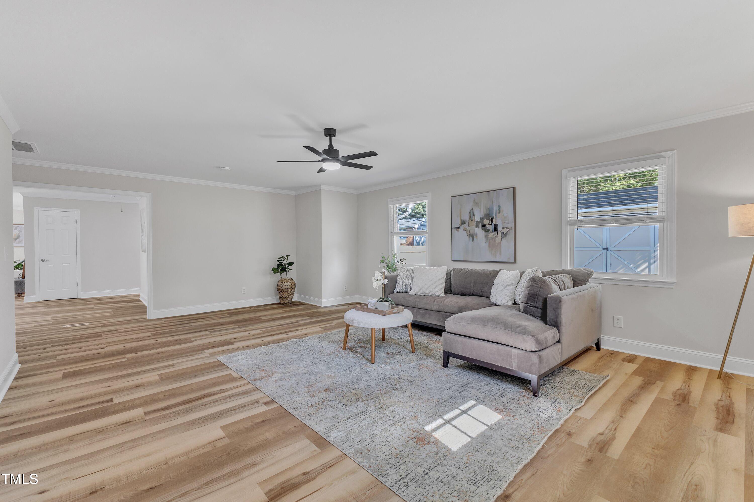 3440 Apache Drive Raleigh, NC 27609 - Photo 17 of 47 a living room with furniture and wooden floor