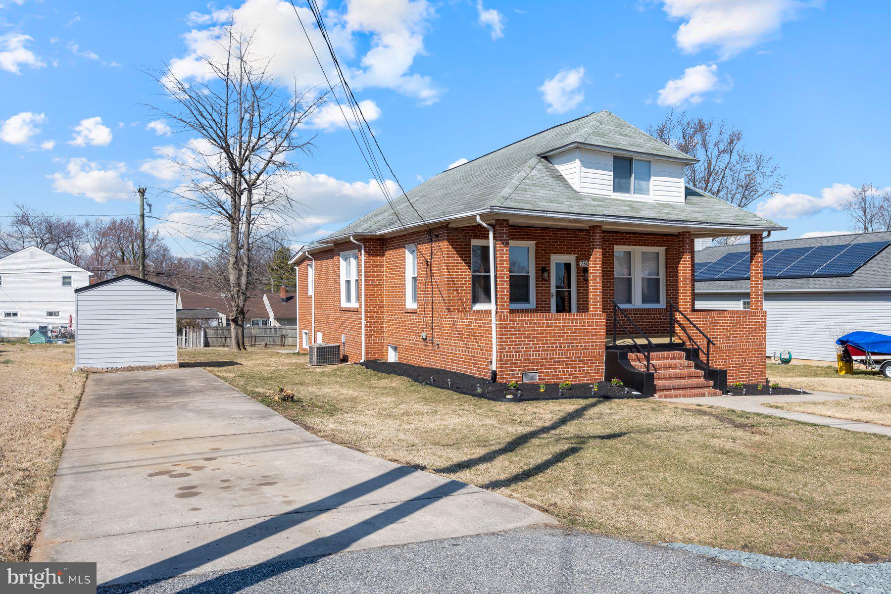 7508 Brightside Avenue Rosedale, MD 21237 - Photo 27 of 27 a front view of a house with a yard
