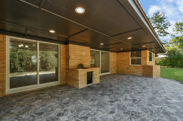a view of a porch with furniture