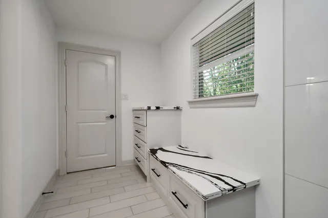 an empty room with windows