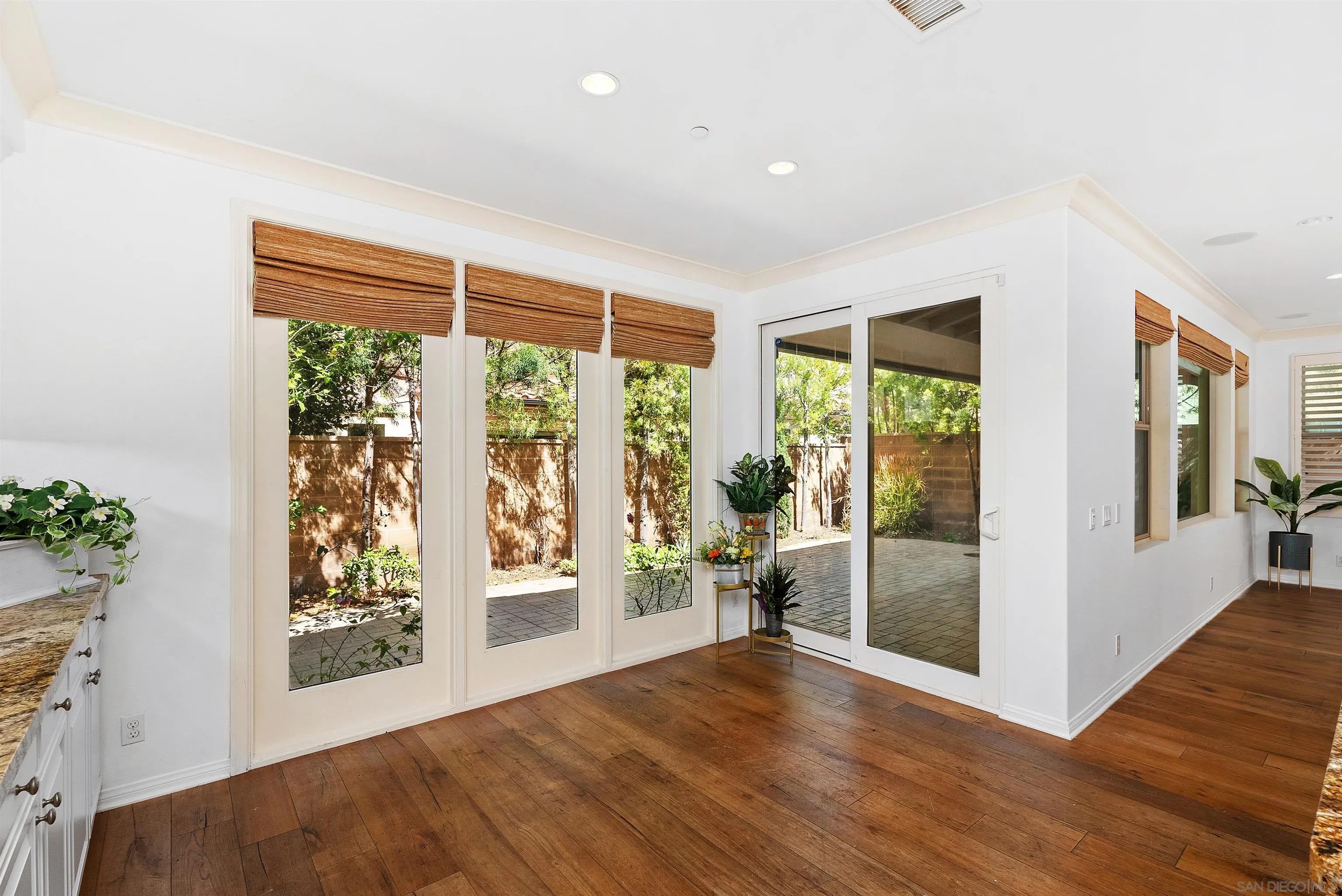 55 Diamond Irvine, CA 92620 - Photo 12 of 30 a view of an empty room with wooden floor and a window
