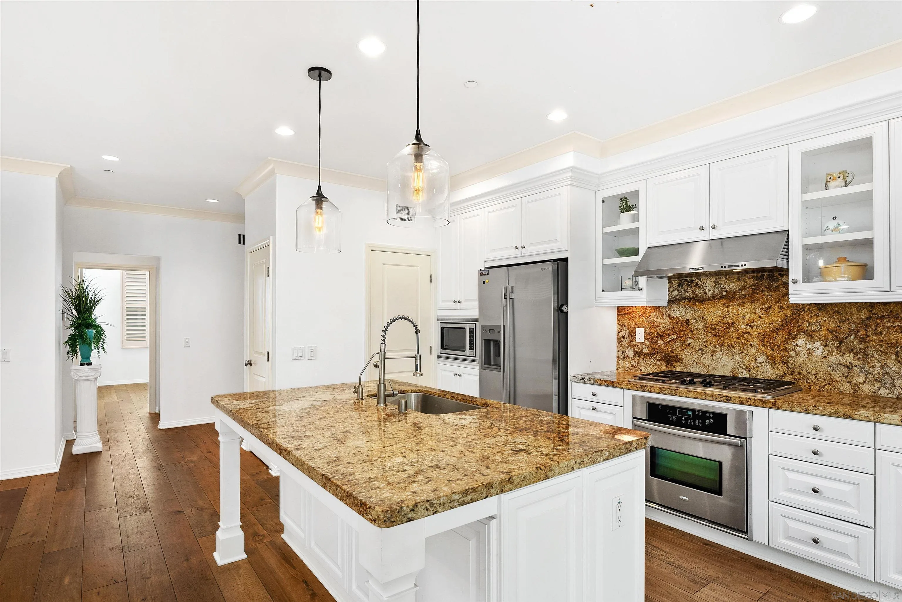 55 Diamond Irvine, CA 92620 - Photo 8 of 30 a kitchen with stainless steel appliances granite countertop a sink a stove and a refrigerator