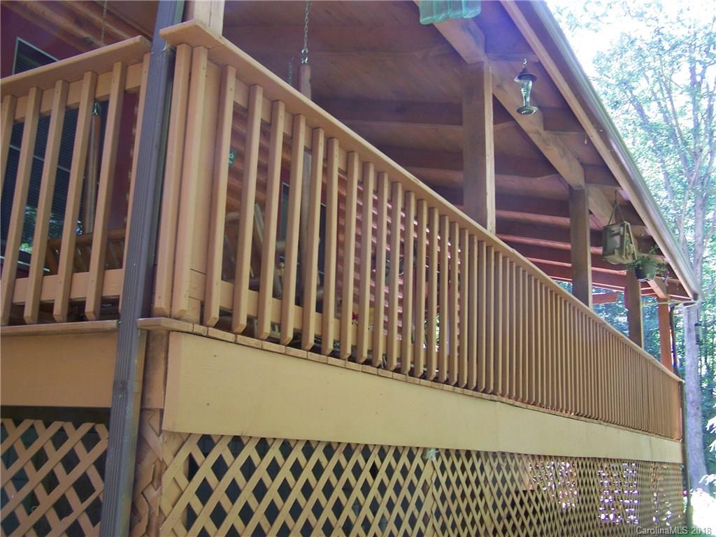 127 Dolan Lane, Unit 8338 Clyde, NC 28721 - Photo 19 of 21 a view of wooden balcony