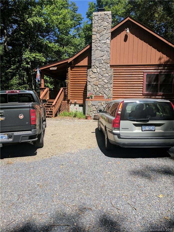 127 Dolan Lane, Unit 8338 Clyde, NC 28721 - Photo 21 of 21 a view of a car parked front of a house