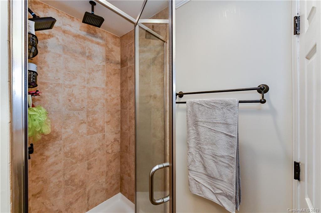 526 Scaleybark Road Charlotte, NC 28209 - Photo 21 of 37 a bathroom with a shower