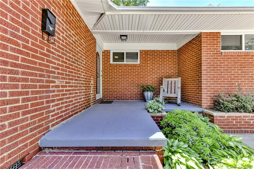 526 Scaleybark Road Charlotte, NC 28209 - Photo 4 of 37 a view of a backyard with sitting area