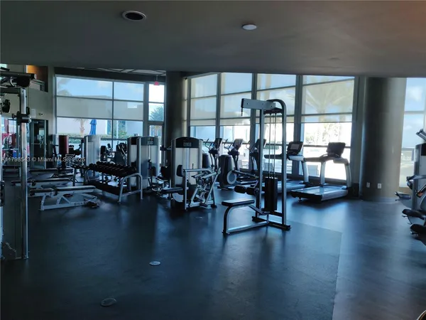 a view of a room with gym equipment