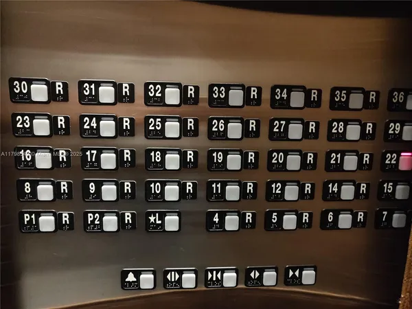 a view of a living room and workspace