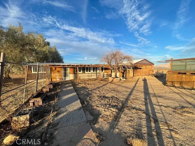 a view of a chairs and table on the terrace