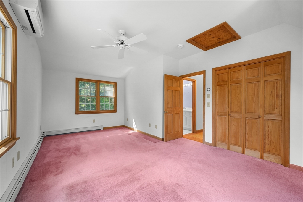 10 Appleseed Road Eastham, MA 02642 - Photo 31 of 42 an empty room with windows and closet