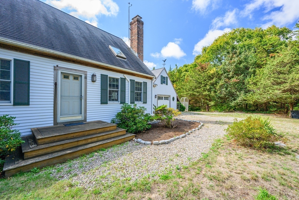 10 Appleseed Road Eastham, MA 02642 - Photo 33 of 42 a front view of a house with garden