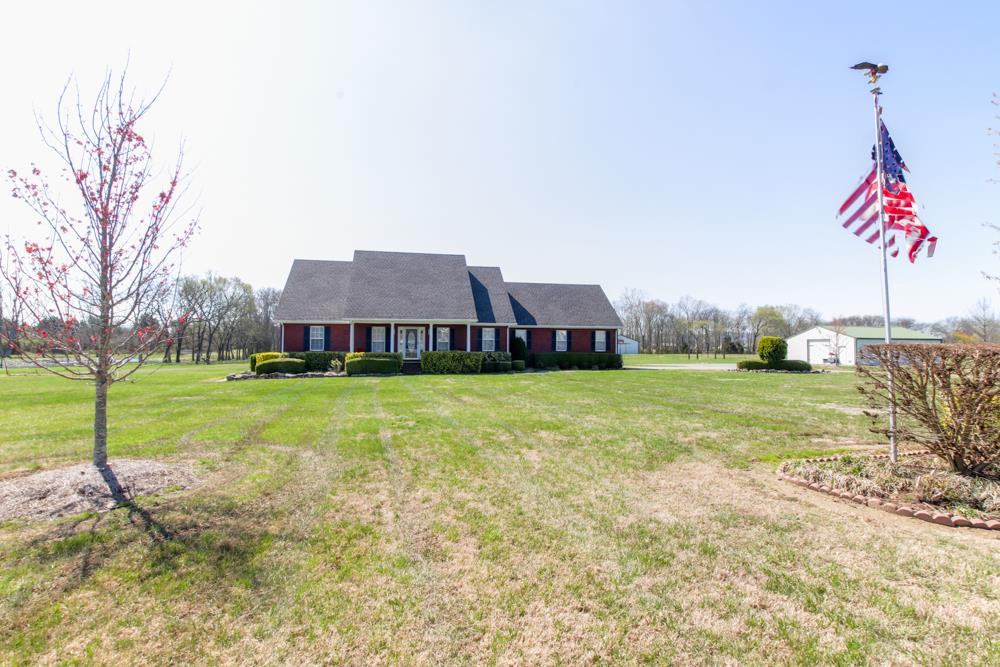 4079 Yeargan Road Murfreesboro, TN 37128 - Photo 1 of 30 a view of a house with backyard and trees