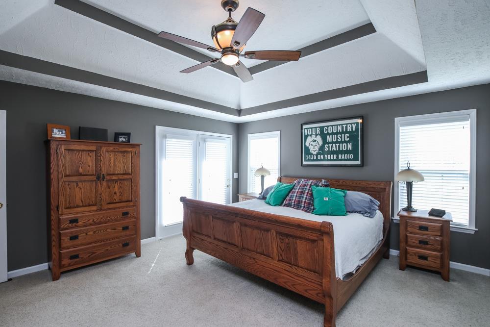 4079 Yeargan Road Murfreesboro, TN 37128 - Photo 16 of 30 a bedroom with a bed and a dresser