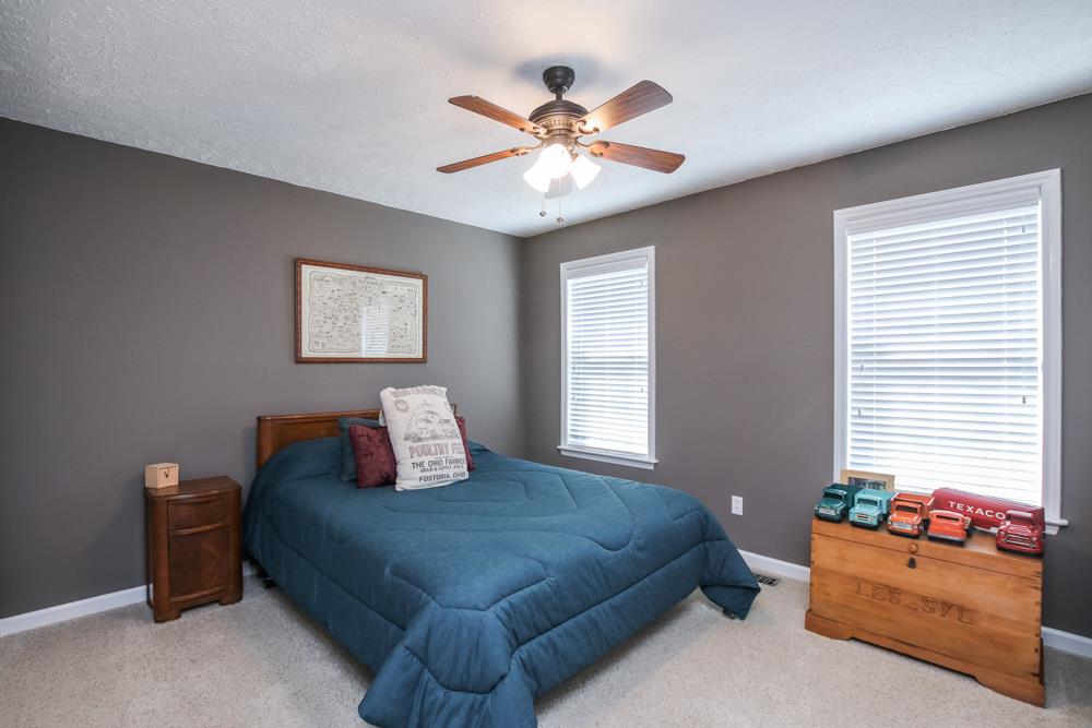4079 Yeargan Road Murfreesboro, TN 37128 - Photo 19 of 30 a bedroom with a bed and window