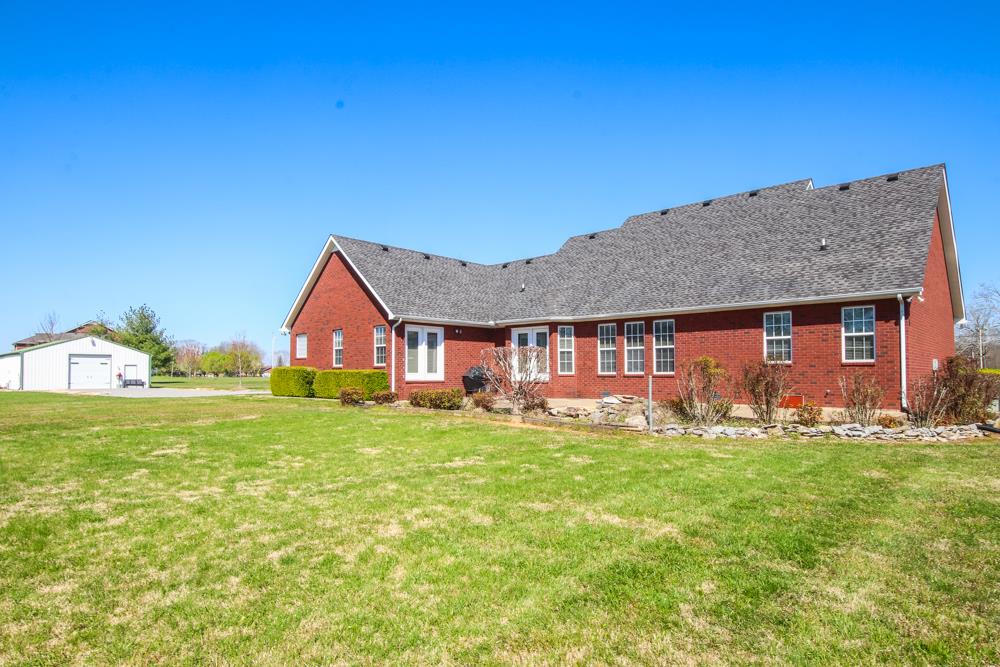 4079 Yeargan Road Murfreesboro, TN 37128 - Photo 23 of 30 a front view of a house with garden