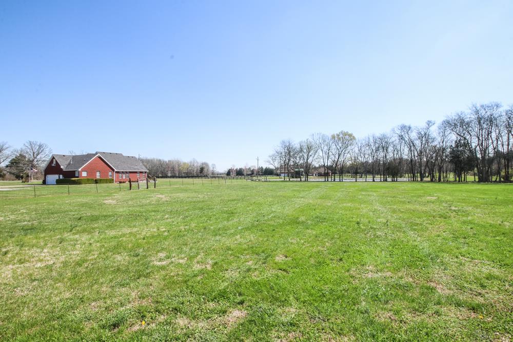 4079 Yeargan Road Murfreesboro, TN 37128 - Photo 30 of 30 a view of a field with grass and trees