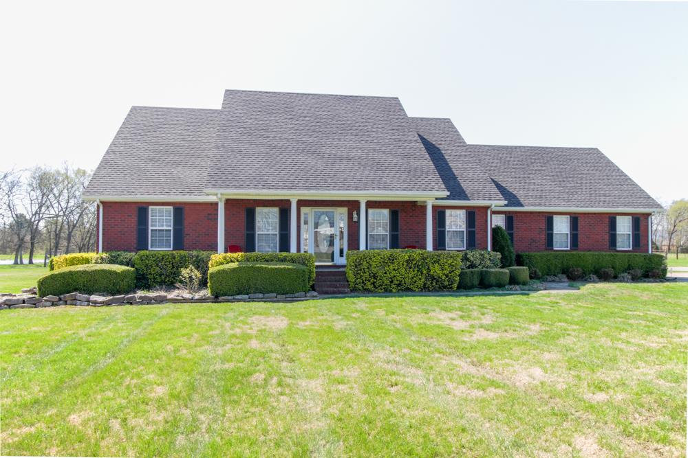 4079 Yeargan Road Murfreesboro, TN 37128 - Photo 3 of 30 a front view of a house with a yard