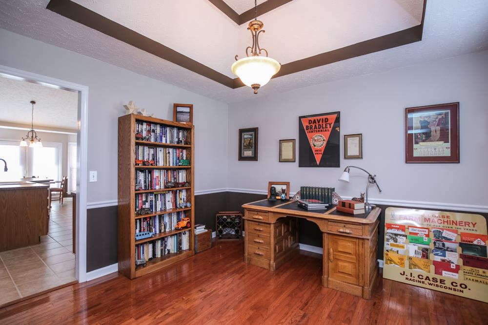 4079 Yeargan Road Murfreesboro, TN 37128 - Photo 8 of 30 a view of a workspace with furniture and wooden floor