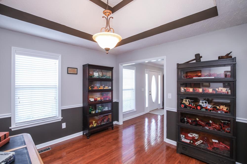 4079 Yeargan Road Murfreesboro, TN 37128 - Photo 9 of 30 a view of a dining room with wooden floor and window