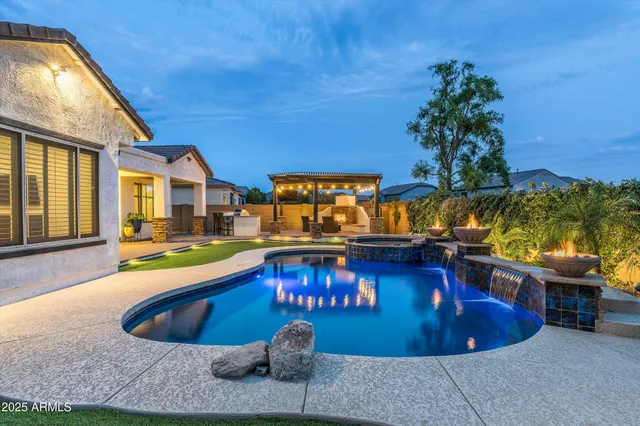 an aerial view of a house with outdoor space