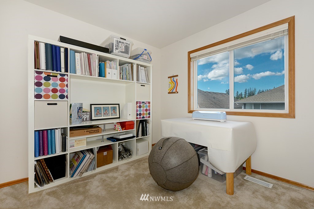 19014 33rd Avenue Southeast Bothell, WA 98012 - Photo 19 of 23 a room with furniture workspace and a window