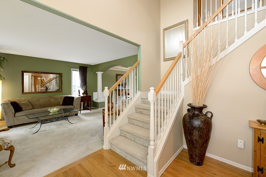 19014 33rd Avenue Southeast Bothell, WA 98012 - Photo 3 of 23 a living room with furniture and a wooden floor