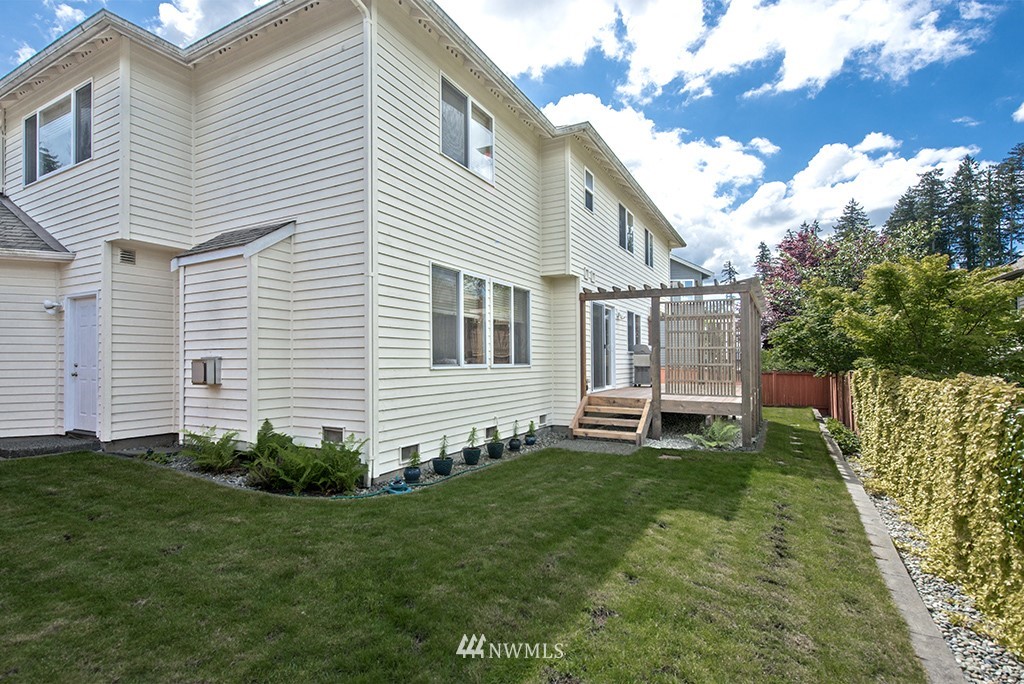 19014 33rd Avenue Southeast Bothell, WA 98012 - Photo 21 of 23 a view of a house with a backyard