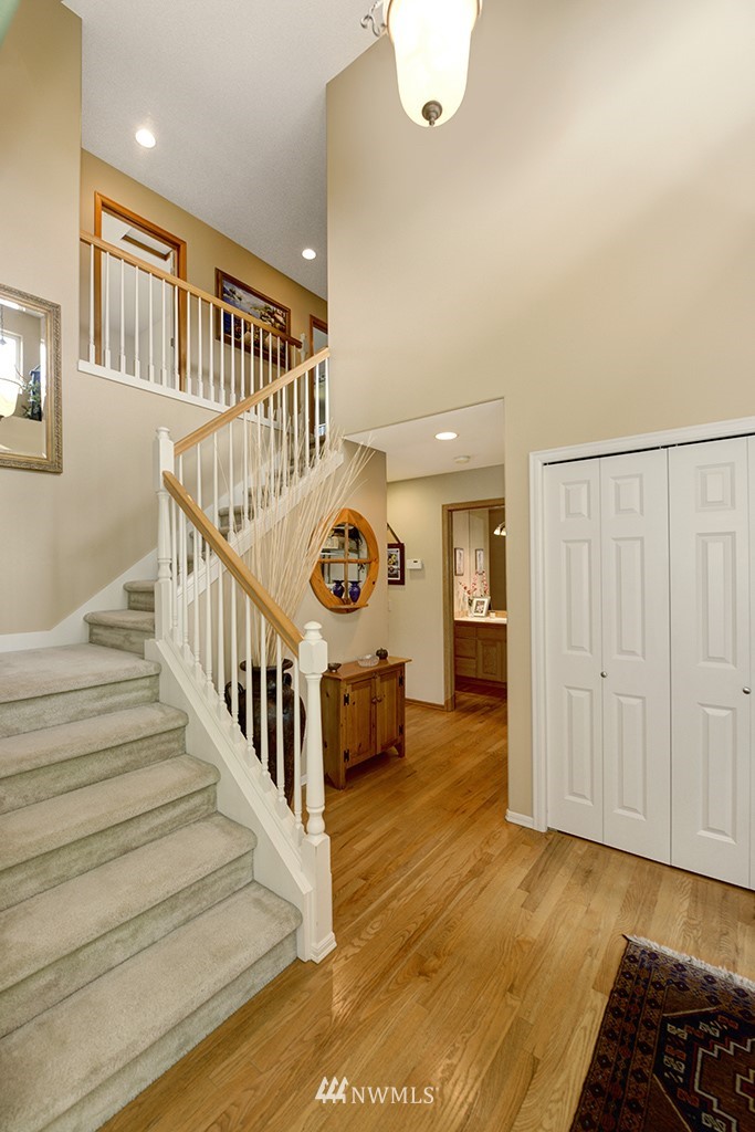 19014 33rd Avenue Southeast Bothell, WA 98012 - Photo 4 of 23 a view of a porch with wooden floor and stairs