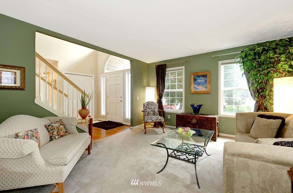 19014 33rd Avenue Southeast Bothell, WA 98012 - Photo 5 of 23 a living room with furniture and a large window