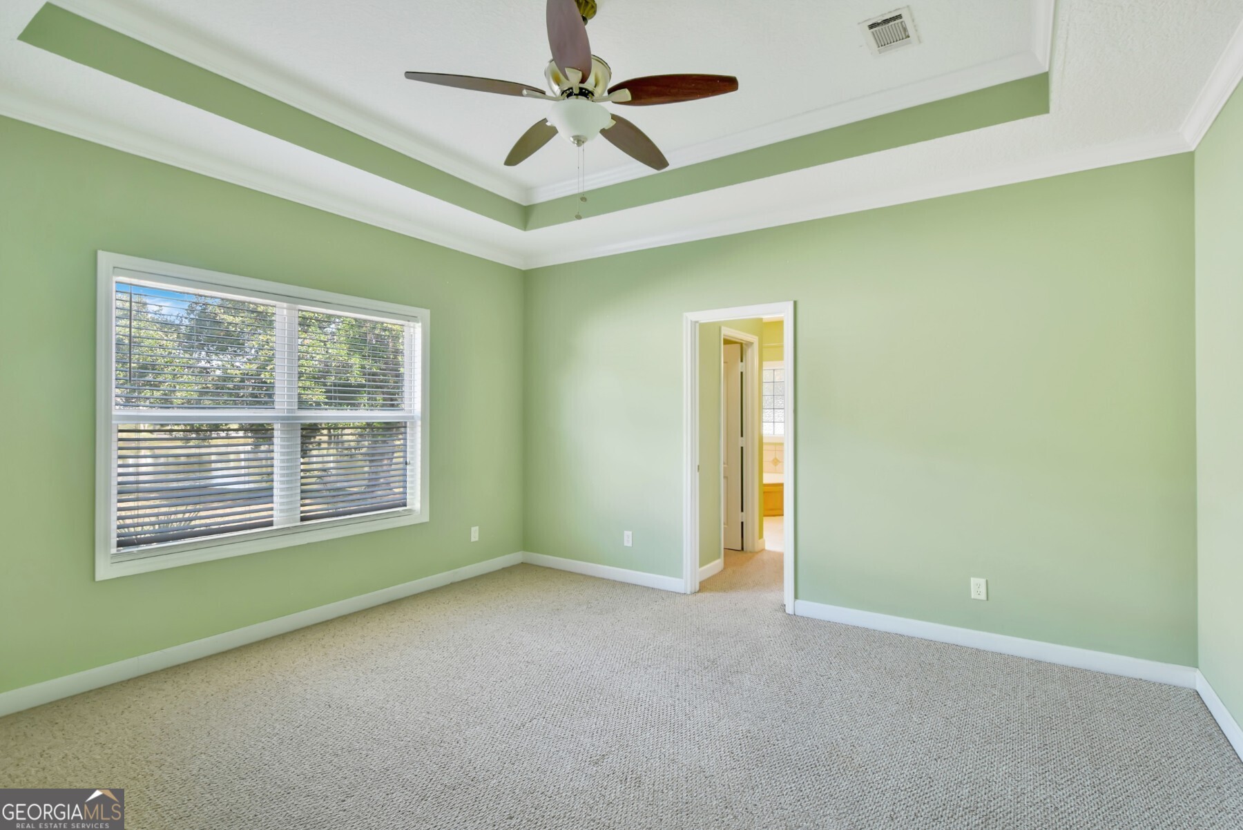 138 Arlington Way Brunswick, GA 31523 - Photo 15 of 32 a view of an empty room with a window