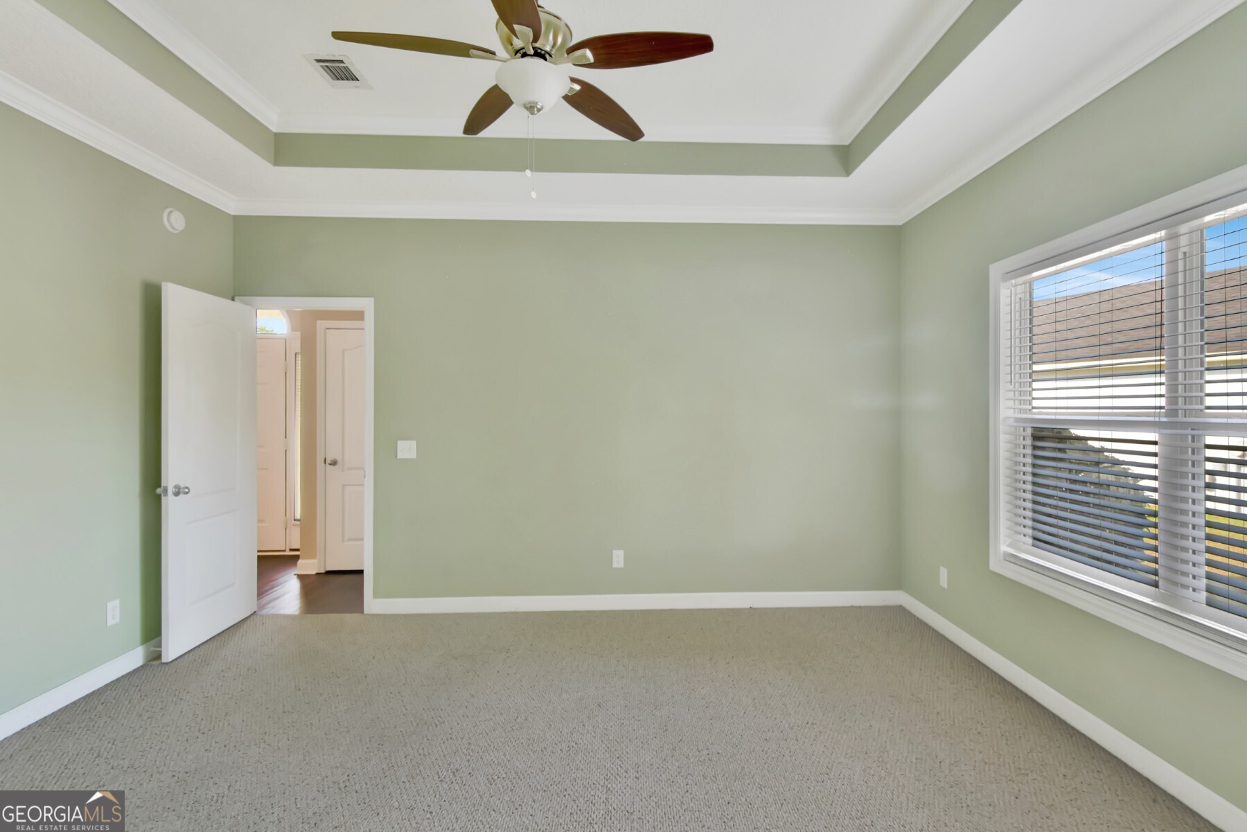 138 Arlington Way Brunswick, GA 31523 - Photo 16 of 32 a view of an empty room with a window