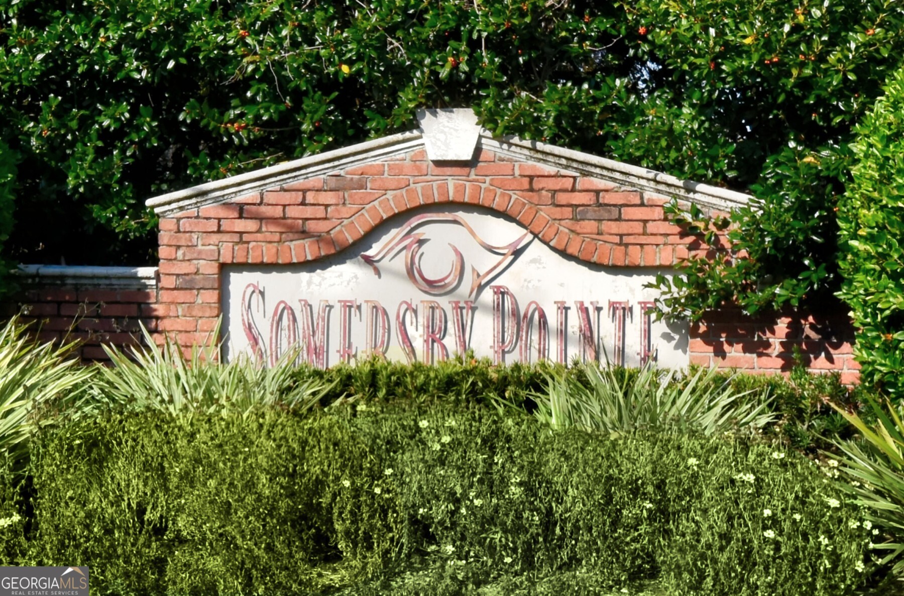 138 Arlington Way Brunswick, GA 31523 - Photo 32 of 32 a view of a sign in a garden