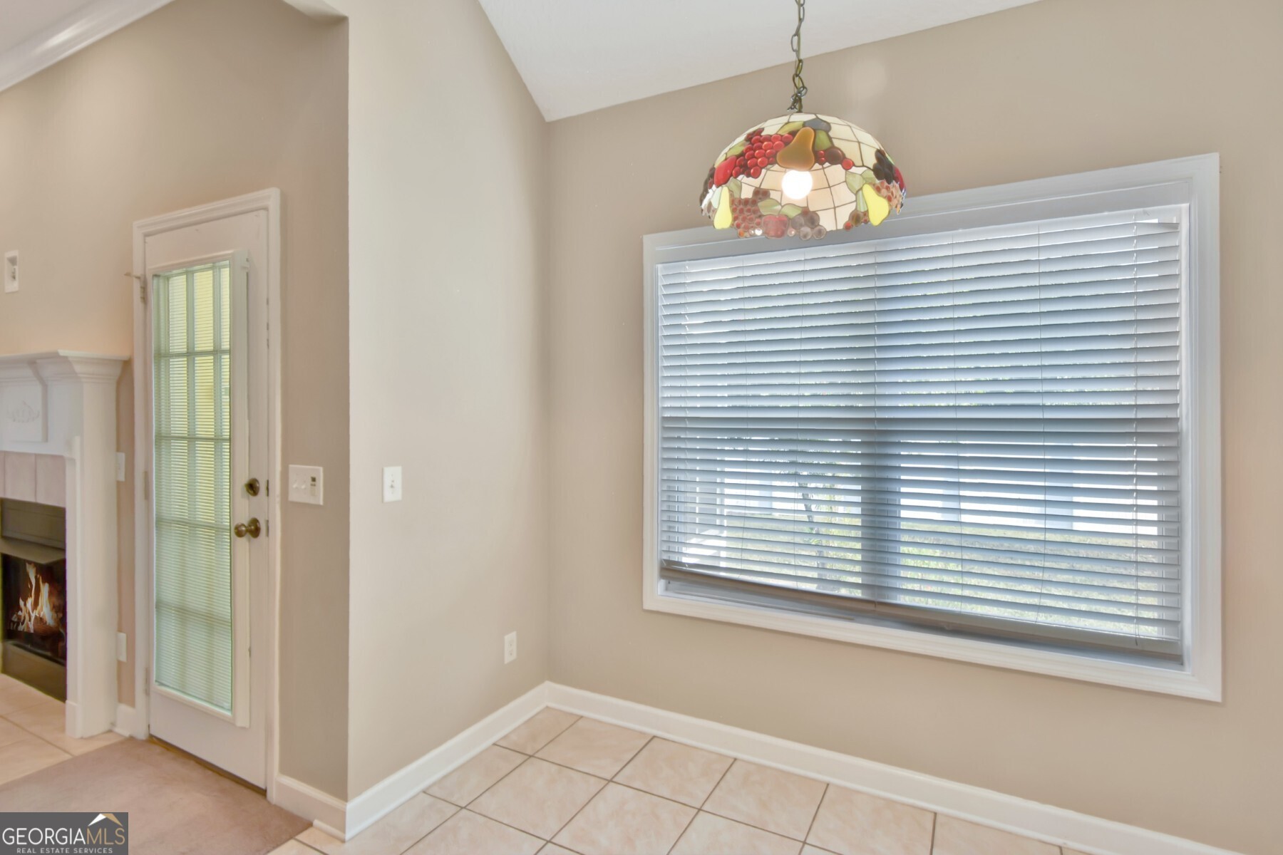 138 Arlington Way Brunswick, GA 31523 - Photo 9 of 32 a view of a hallway with windows and chandelier