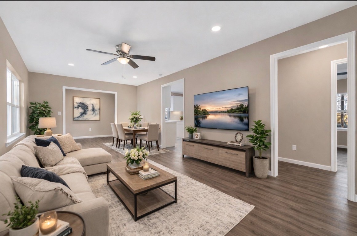 408 North Speed Street Wharton, TX 77488 - Photo 2 of 11 a living room with furniture and wooden floor