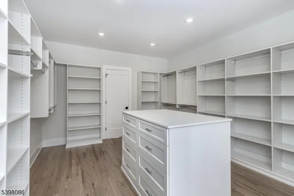 a view of cabinets and wooden floor