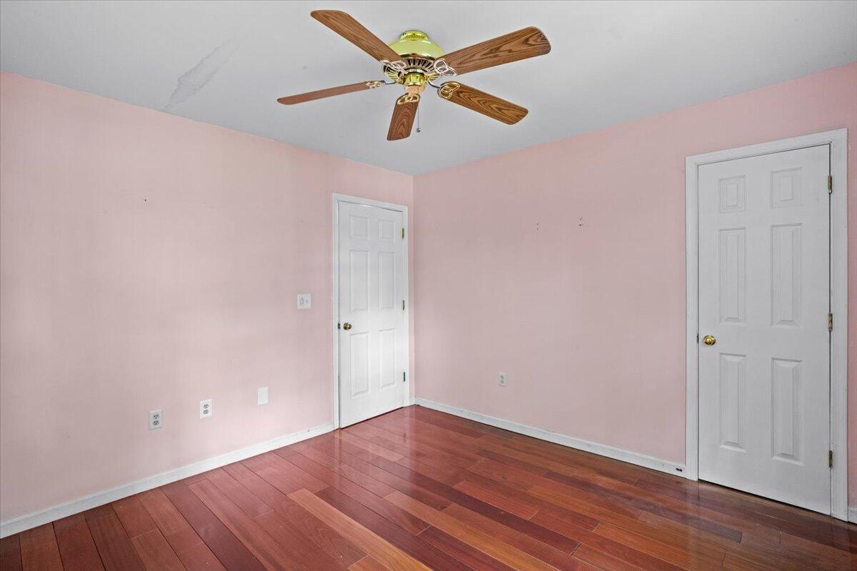 292 Clearview Road Long Pond, PA 18334 - Photo 19 of 33 an empty room with wooden floor and a ceiling fan