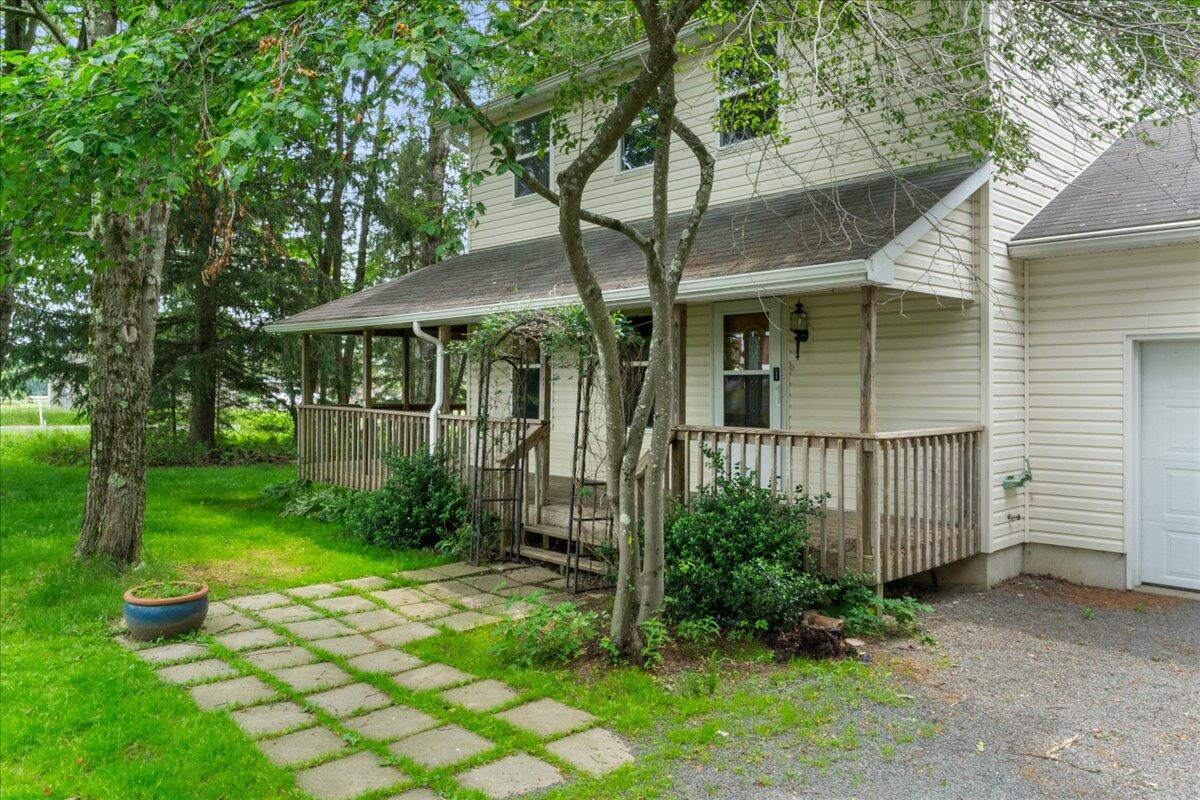 292 Clearview Road Long Pond, PA 18334 - Photo 2 of 33 a view of a white house with a yard and potted plants