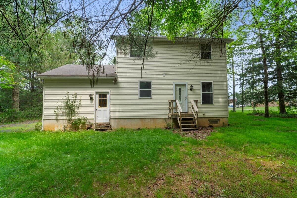 292 Clearview Road Long Pond, PA 18334 - Photo 27 of 33 a front view of a house with a yard and tree