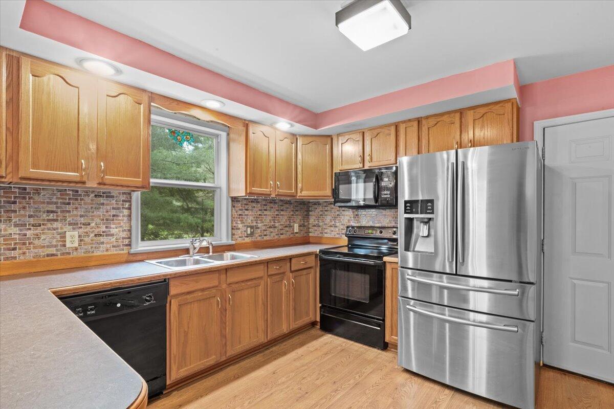 292 Clearview Road Long Pond, PA 18334 - Photo 9 of 33 a kitchen with a sink refrigerator and window