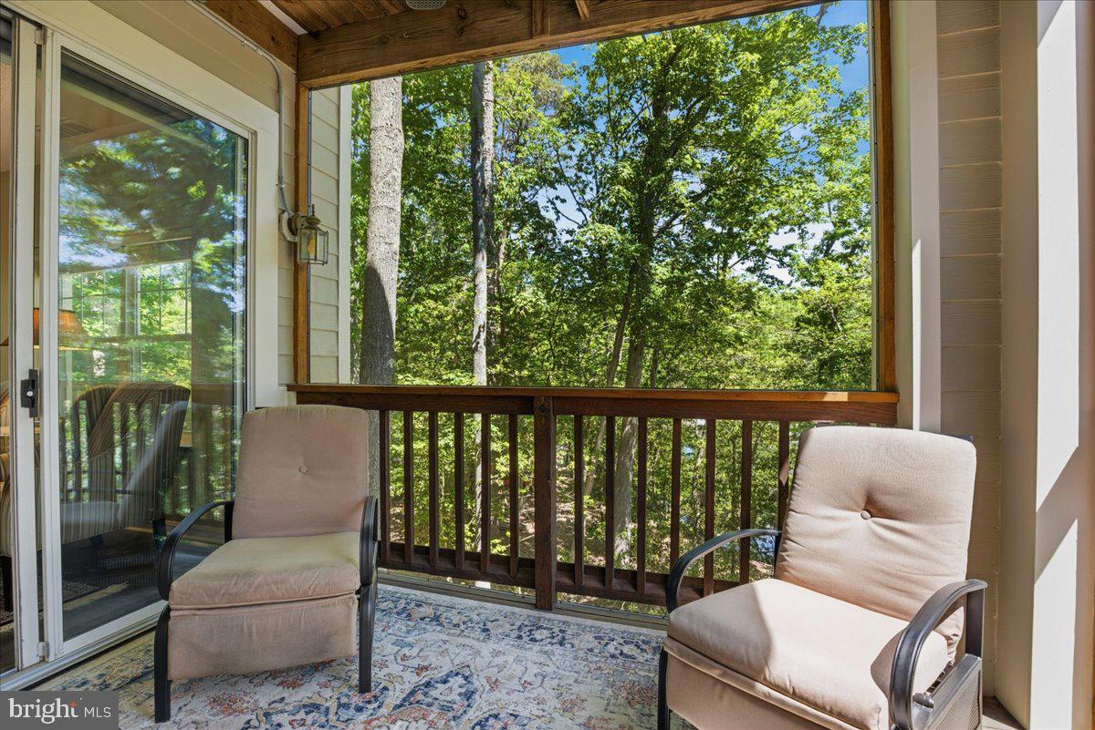 1126 Back Creek Loop, Unit 1126 Solomons, MD 20688 - Photo 22 of 47 Open the porch doors and extend the living area