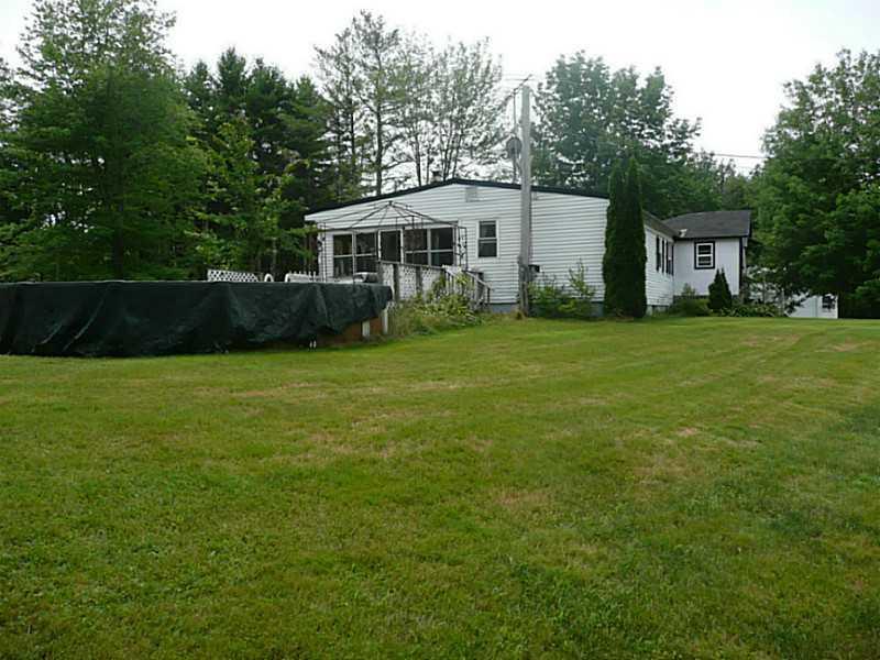 880 Long Plains Road Buxton, ME 04093 - Photo 1 of 27 Exterior Front.