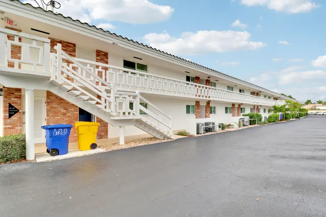 a front view of building with large windows